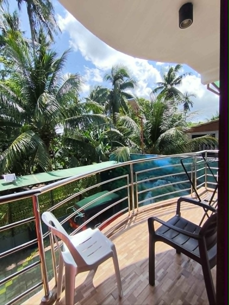 Deluxe Triple Room at Zosimo’s Inn in Lazi, Siquijor — room interior
